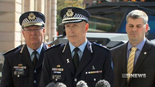 (L-R)Queensland Police Commissioner Ian Stewart, Deputy Commissioner Steve Gollschewski and police minister Mark Ryan. Picture: 9NEWS