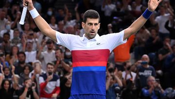 Novak Djokovic of Serbia celebrates after winning match point in the men&#x27;s singles final against Daniil Medvedev of Russia on day seven of the Paris Masters.