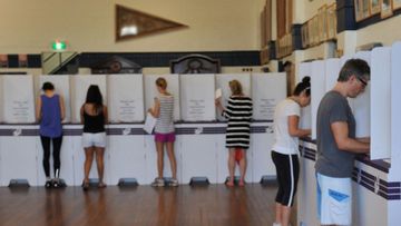 Australians cast their vote. (AAP)