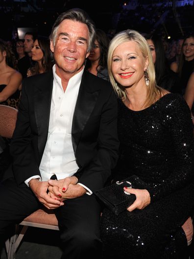 Singer Olivia Newton-John and husband John Easterling attend the 2013 American Country Awards at the Mandalay Bay Events Center on December 10, 2013 in Las Vegas, Nevada.