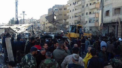 Death toll from suicide blasts in Damascus rises to 70