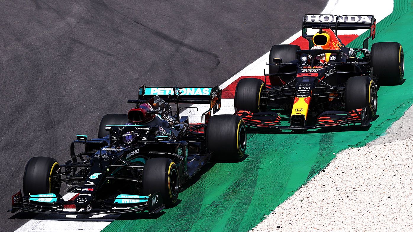 Max Verstappen goes off track in his battle with Lewis Hamilton at the Portuguese Grand Prix.