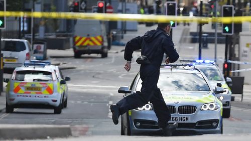 Police cordon off the Manchester Arena in central Manchester, Britain on May 23, 2017. (AAP)