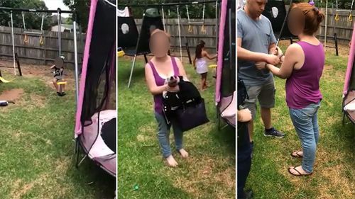 Video, filmed on Australia Day, shows the enraged dad accusing the stranger of trying to steal his child. (Facebook)
