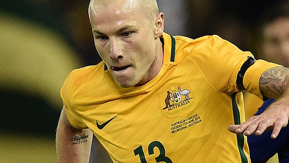 Socceroos midfielder Aaron Mooy back-tracks over post-match comments about coach Ange Postecoglu