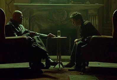 Morpheus offers Neo pill in The Matrix (Warner Bros)