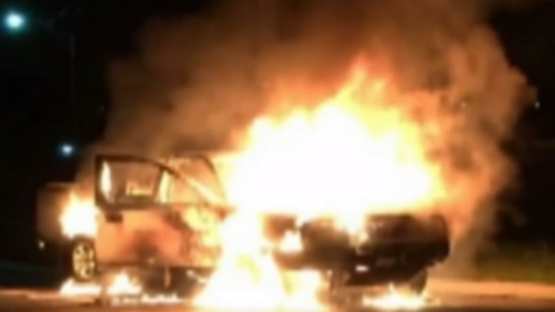 A Nissan Navara ute was torched after the alleged robbery. (9NEWS)