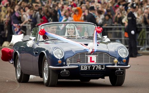 Of course, the princess's cousin, Prince William, was pictured after his wedding to Kate Middleton entertaining crowds in an Aston Martin, a DB6 Vantage Volante.