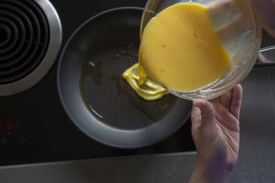 Cooking eggs in a kitchen