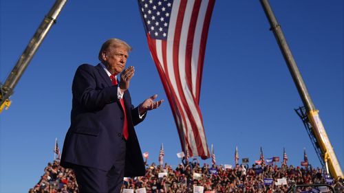 Donald Trump arrives at a campaign rally at the Butler Farm Show, Saturday, Oct. 5, 2024