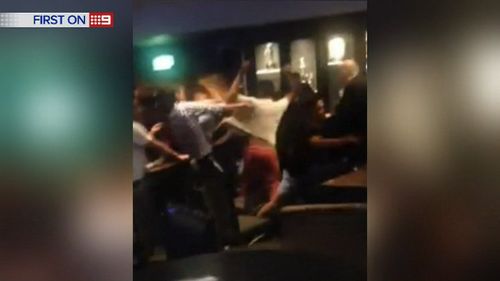 Bar stools, chairs and plates were thrown in the brawl. (9NEWS)