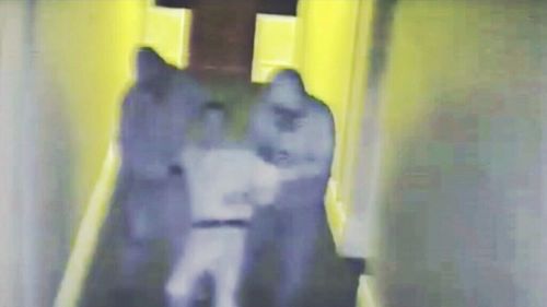Detectives are hunting for two men who were caught on CCTV at the Premier Hotel in Albany, where they assaulted the manager and stole cash, before setting fire to the building.