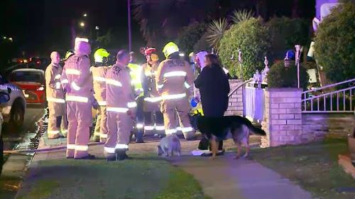 In a separate incident, another family was dragged from their Chipping Norton home by police officers who noticed smoke billowing from inside. Picture: 9NEWS.