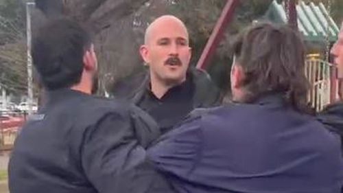 Neo-Nazi Thomas Sewell gatecrashes a Victorian government press conference on Tuesday morning.