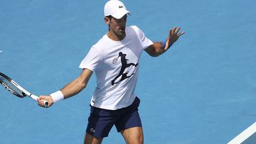 Novak Djokovic practices at Rod Laver Arena ahead of the 2022 Australian Open at Melbourne Park.