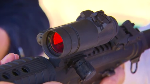 The AR-15s are lightweight, semi-automatic guns that use laser optics and are deadly accurate. (9NEWS)