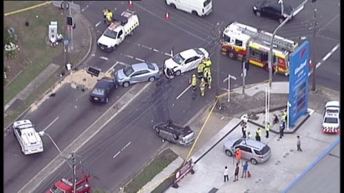 Three people injured after four car crash at Yagoona, in Sydney’s south west
