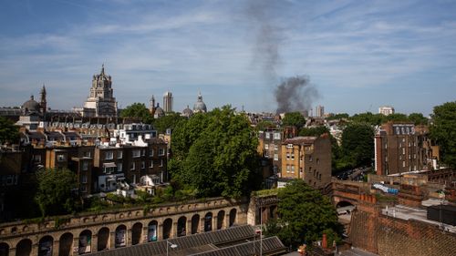 Thick plumes of smoke could be seen across central London. (AAP)