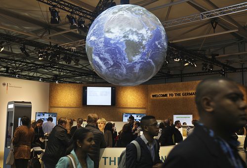 Delegates and visitors walk inside the German pavilion at the World Climate Conference in Bonn, Germany. (AAP)