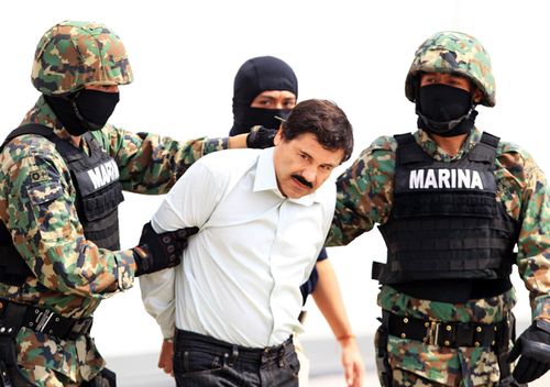 Mexican military hold Mexican drug lord Joaquin Guzman Loera, alias 'El Chapo' at the Navy hangar in Mexico City, Mexico in 2014.