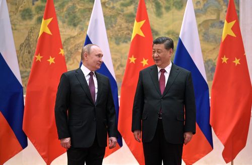 Chinese President Xi Jinping, right, and Russian President Vladimir Putin pose for a photo prior to their talks in Beijing, China, Friday, Feb. 4, 2022. Russian President Vladimir Putin is in Beijing for the Winter Olympics and talks with his Chinese counterpart Xi Jinping, amid soaring tensions with Ukraine.