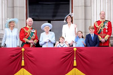 Queen Elizabeth II smiles on the balcony of Buckingham Palace during Trooping the Colour alongside (L-R) Camilla, Duchess of Cornwall, Prince Charles, Prince of Wales, Prince Louis of Cambridge, Catherine, Duchess of Cambridge and Prince Charlotte of Cambridge during Trooping The Colour on June 02, 2022 in London, England. 