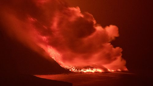 Lava from a volcano reaches the sea on the Canary island of La Palma, Spain. 