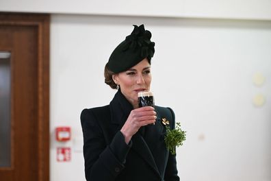 LONDON, ENGLAND - MARCH 17: Catherine, Princess of Wales in her role as Colonel, Irish Guards, takes a sip of Guinness during a visit to the 2025 Irish Guards' St. Patrick's Day Parade at Wellington Barracks on March 17, 2025 in London, England. Catherine, Princess of Wales attends the parade as Colonel of the Regiment. (Photo by  Eddie Mulholland - WPA Pool/Getty Images)