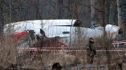 Families divided as Poland starts to exhume 2010 crash victims