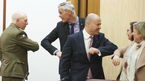 Lieutenant General John Frewen, Tony Mahar from the National Farmers' Federation, Treasurer Josh Frydenberg , Tania Constable from the Minerals Council of Australia and Denita Wawn from Master Builders Australia during a roundtable meeting with business leaders to discuss the vaccine rollout.