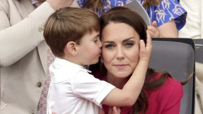 Prince Louis hugs Kate, Duchess of Cambridge, during the Platinum Jubilee Pageant held outside Buckingham Palace, in London, Sunday June 5, 2022, on the last of four days of celebrations to mark the Platinum Jubilee. 