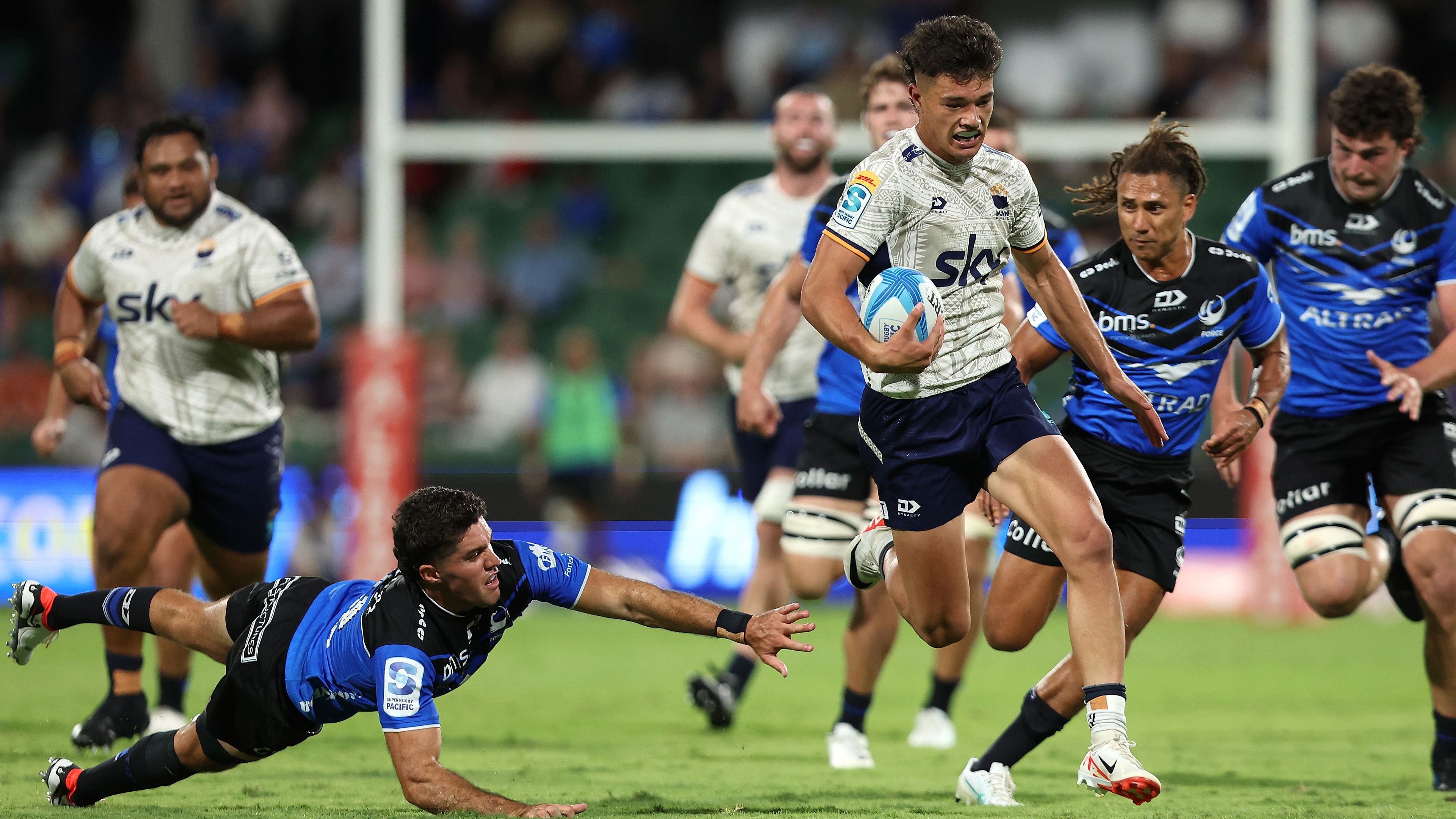 Kyren Taumoefolau of Moana Pasifika runs in for a try during the round four Super Rugby Pacific match between Western Force and Moana Pasifika.
