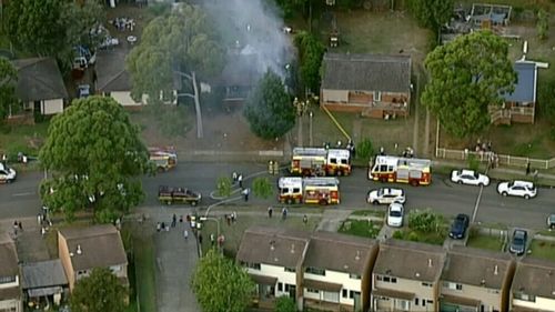 Police launched an investigation into the Ambarvale fire. (9NEWS)