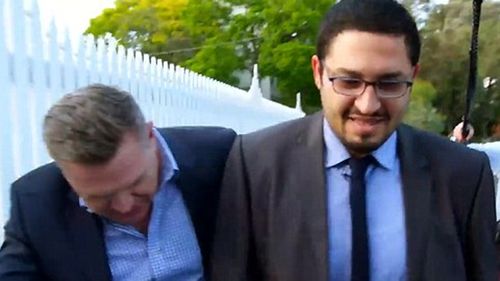 Reporter Michael Usher confronts Mazen Hassan Baioumy in Melbourne. (Photo: 60 Minutes)