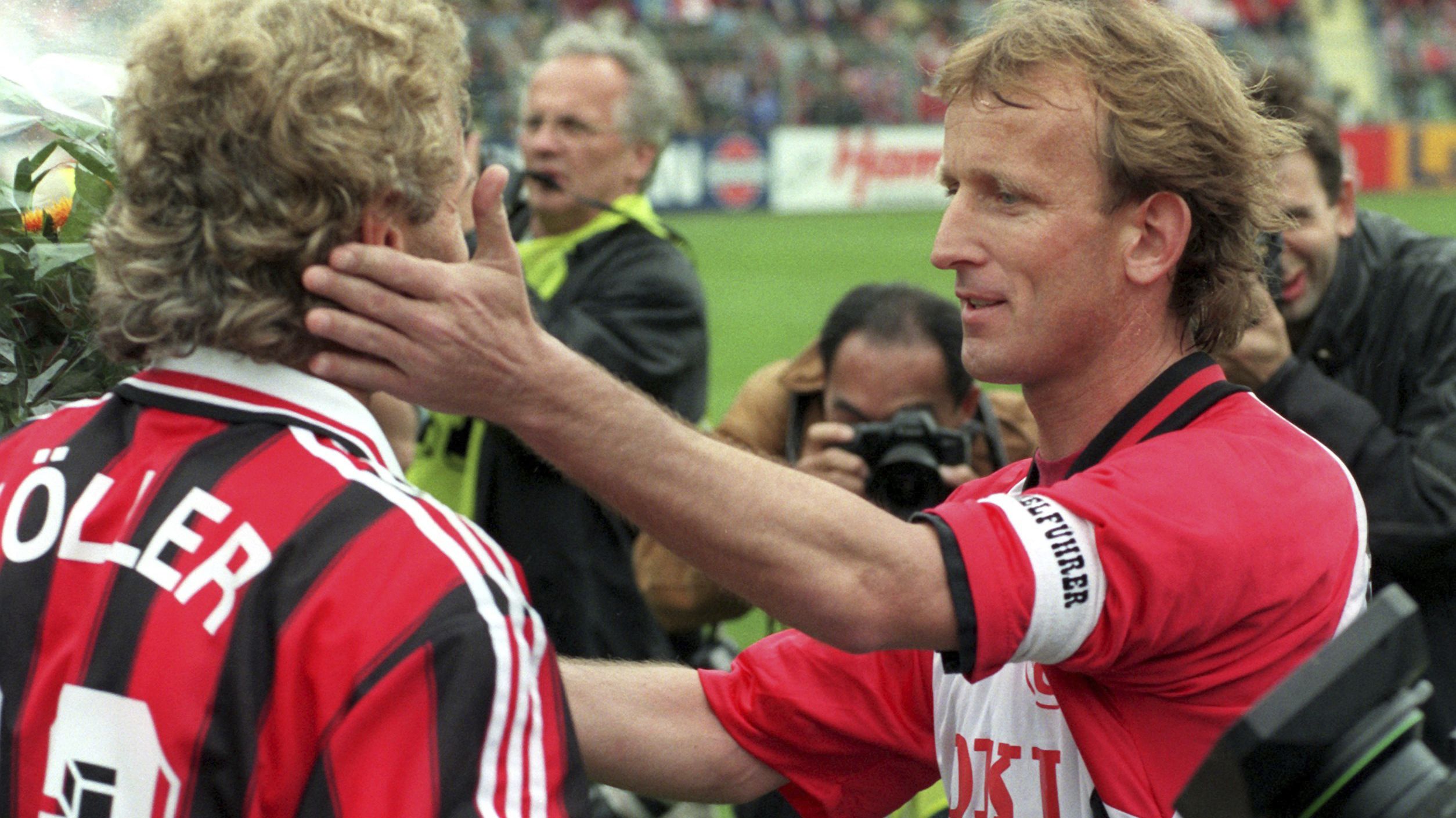 Andreas Brehme (right) and Leverkusen&#x27;s Rudi Voeller in 1996.