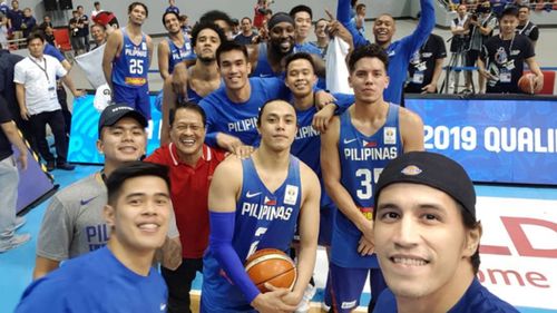 Philippines basketball team take a selfie during the game, after the fight erupted. Picture: Supplied