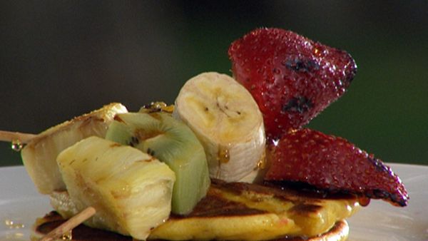 Ricotta hotcakes with grilled fruit skewers and maple